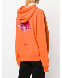 orange bedruckter Pullover mit einer Kapuze von Heron Preston