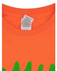 orange bedrucktes Langarmshirt von Kanye West