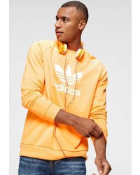 orange bedrucktes Sweatshirt von adidas Originals