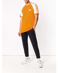 orange bedrucktes T-Shirt mit einem Rundhalsausschnitt von adidas