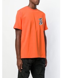 orange bedrucktes T-Shirt mit einem Rundhalsausschnitt von Champion