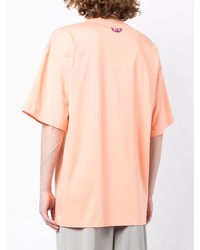 orange bedrucktes T-Shirt mit einem Rundhalsausschnitt von Oamc