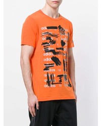 orange bedrucktes T-Shirt mit einem Rundhalsausschnitt von Adidas By Kolor