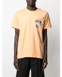 orange bedrucktes T-Shirt mit einem Rundhalsausschnitt von Stussy