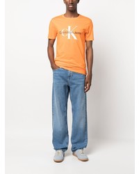 orange bedrucktes T-Shirt mit einem Rundhalsausschnitt von Calvin Klein Jeans