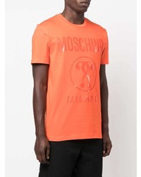 orange bedrucktes T-Shirt mit einem Rundhalsausschnitt von Moschino