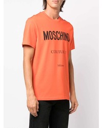 orange bedrucktes T-Shirt mit einem Rundhalsausschnitt von Moschino