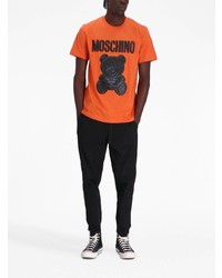 orange bedrucktes T-Shirt mit einem Rundhalsausschnitt von Moschino