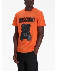 orange bedrucktes T-Shirt mit einem Rundhalsausschnitt von Moschino