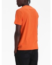 orange bedrucktes T-Shirt mit einem Rundhalsausschnitt von Moschino