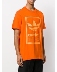 orange bedrucktes T-Shirt mit einem Rundhalsausschnitt von adidas