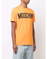 orange bedrucktes T-Shirt mit einem Rundhalsausschnitt von Moschino