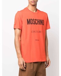 orange bedrucktes T-Shirt mit einem Rundhalsausschnitt von Moschino