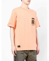 orange bedrucktes T-Shirt mit einem Rundhalsausschnitt von Alpha Industries