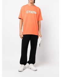 orange bedrucktes T-Shirt mit einem Rundhalsausschnitt von Heron Preston