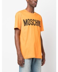 orange bedrucktes T-Shirt mit einem Rundhalsausschnitt von Moschino