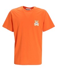 orange bedrucktes T-Shirt mit einem Rundhalsausschnitt von Moschino