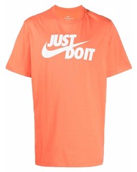 orange bedrucktes T-Shirt mit einem Rundhalsausschnitt von Nike