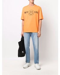 orange bedrucktes T-Shirt mit einem Rundhalsausschnitt von Moschino