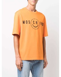 orange bedrucktes T-Shirt mit einem Rundhalsausschnitt von Moschino