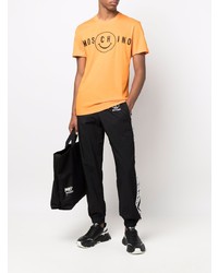 orange bedrucktes T-Shirt mit einem Rundhalsausschnitt von Moschino