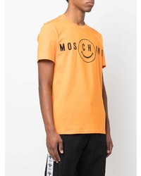 orange bedrucktes T-Shirt mit einem Rundhalsausschnitt von Moschino