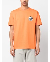 orange bedrucktes T-Shirt mit einem Rundhalsausschnitt von Stussy