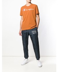 orange bedrucktes T-Shirt mit einem Rundhalsausschnitt von Champion