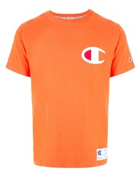 orange besticktes T-Shirt mit einem Rundhalsausschnitt von Champion