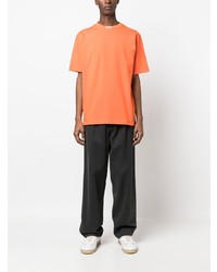 orange besticktes T-Shirt mit einem Rundhalsausschnitt von Heron Preston