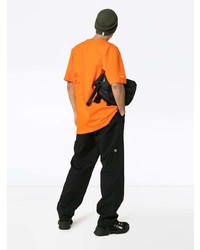 orange besticktes T-Shirt mit einem Rundhalsausschnitt von Heron Preston