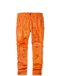 orange enge Jeans mit Destroyed-Effekten von EV BRAVADO