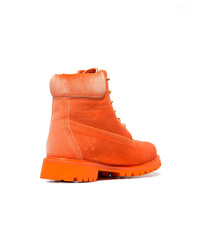 orange flache Stiefel mit einer Schnürung von Off-White