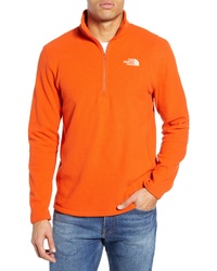 orange Fleece-Pullover mit einem Reißverschluss am Kragen