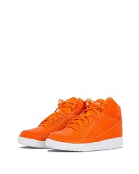 orange hohe Sneakers aus Leder mit Schlangenmuster von Nike