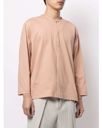 orange Langarmshirt mit einer Knopfleiste von Homme Plissé Issey Miyake