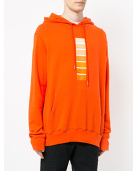 orange Pullover mit einem Kapuze