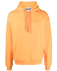orange Pullover mit einem Kapuze von Moschino