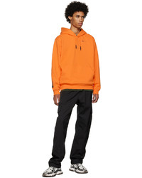 orange Pullover mit einem Kapuze von McQ