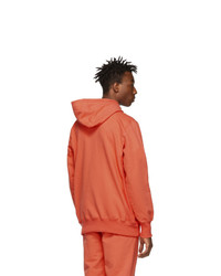 orange Pullover mit einem Kapuze von Aimé Leon Dore