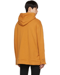 orange Pullover mit einem Kapuze von Undercoverism