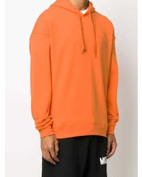 orange Pullover mit einem Kapuze von Moschino