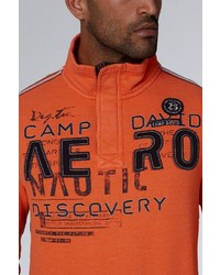 orange Pullover mit einem zugeknöpften Kragen von Camp David