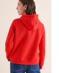 orange Pullover mit einer Kapuze von Cecil