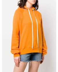 orange Pullover mit einer Kapuze von Unravel Project