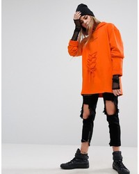 orange Pullover mit einer Kapuze von Criminal Damage