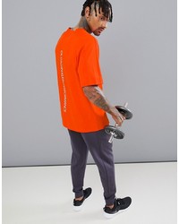 orange T-Shirt mit einem Rundhalsausschnitt von Calvin Klein Performance