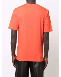 orange T-Shirt mit einem Rundhalsausschnitt von Moschino