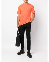 orange T-Shirt mit einem Rundhalsausschnitt von Moschino