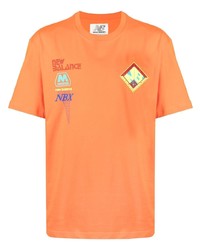 orange T-Shirt mit einem Rundhalsausschnitt von New Balance